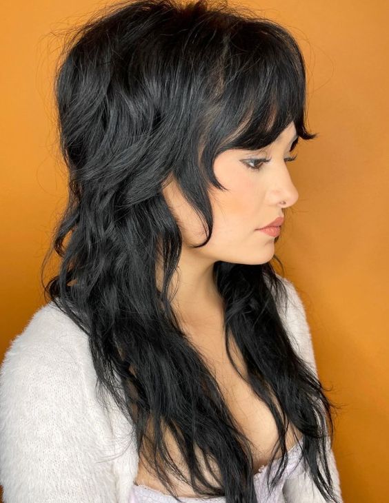 15 Stylish Wolf Haircut Ideas with Bangs: Embrace the Edgy Vibe ...