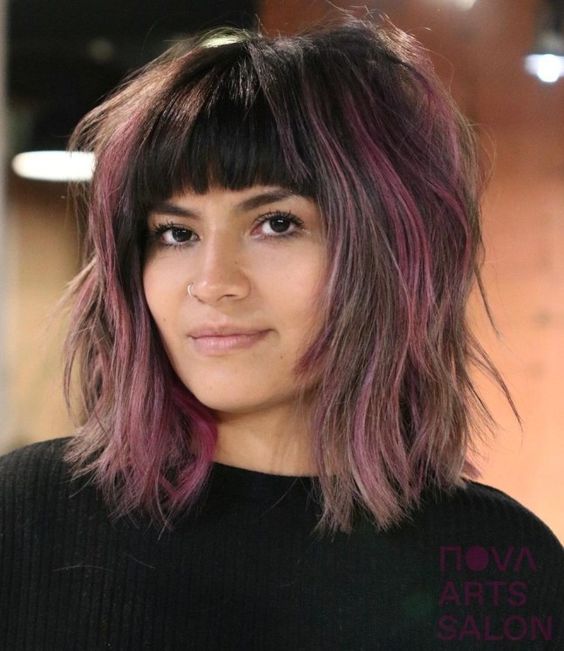 15 Stylish Wolf Haircut Ideas with Bangs: Embrace the Edgy Vibe