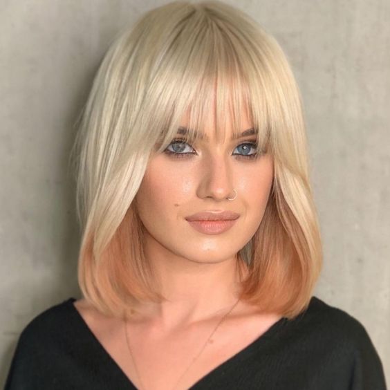 15 Flattering Medium Haircuts for Round Faces: Enhance Your Features with Style