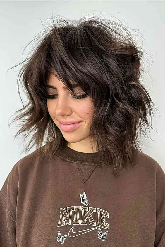 15 Trendy Fall Haircuts with Long Bangs
