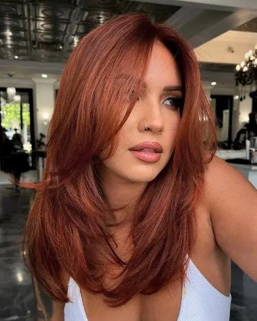 17 Stunning Fall Hair Colors with Curtain Bangs: Embrace the Season's Beauty