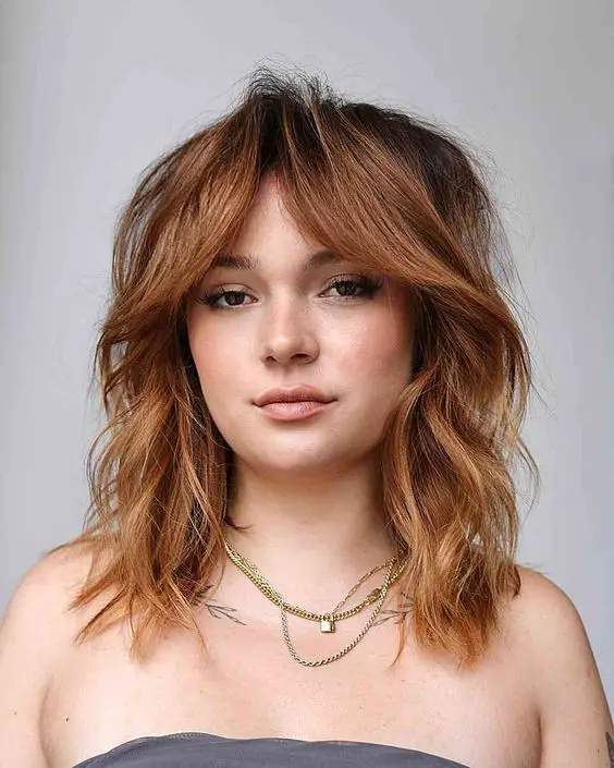 Chic Haircuts with Curtain Bangs - Embrace the Timeless Trend