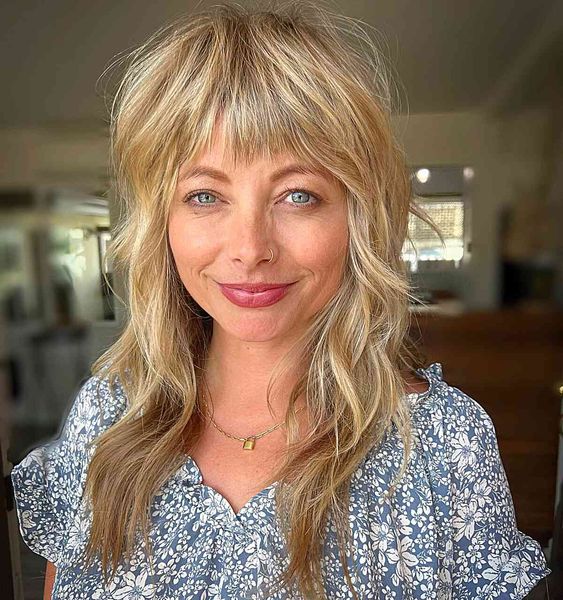 15 Flattering Hairstyle Ideas for Women Over 40 with Bangs