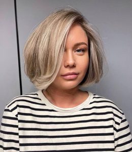 15 Stylish Winter Haircuts for Round Faces in 2023-2024 - thepinkgoose.com