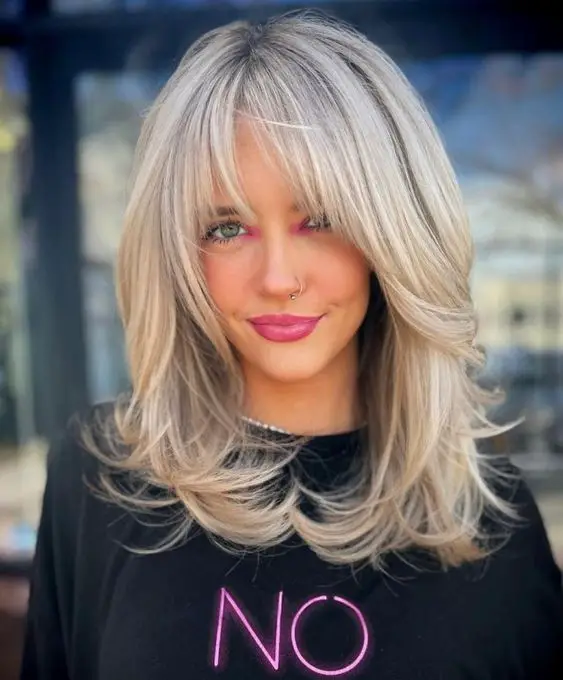 17 Trendy Winter Haircuts with Bangs for 2023-2024 - thepinkgoose.com