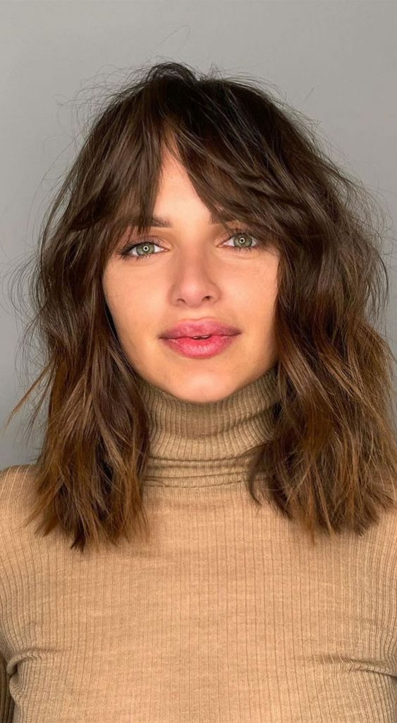 15 Haircut Ideas with Bangs for 2024: Short, Medium, Long, and Curly Styles