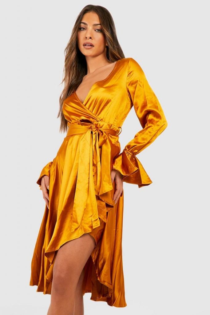 15 Stunning Gold New Year's Dress Ideas to Shine in 2024