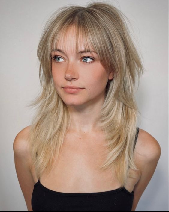 17 Stylish Hairstyles with Bangs 2024: From Long Bobs to Short Pixies