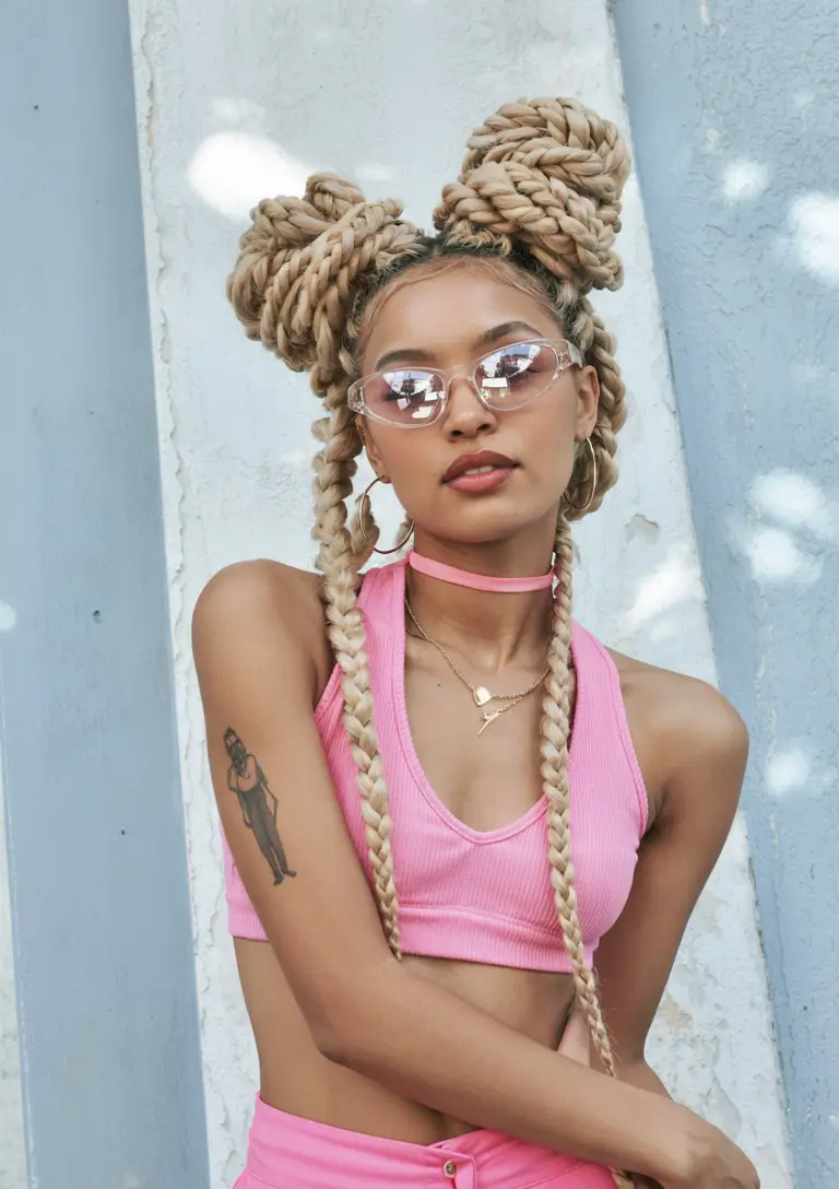 Vacation Hairstyles for Summer 2025: Chic Inspiration Giant Braided Buns with Statement Plaits