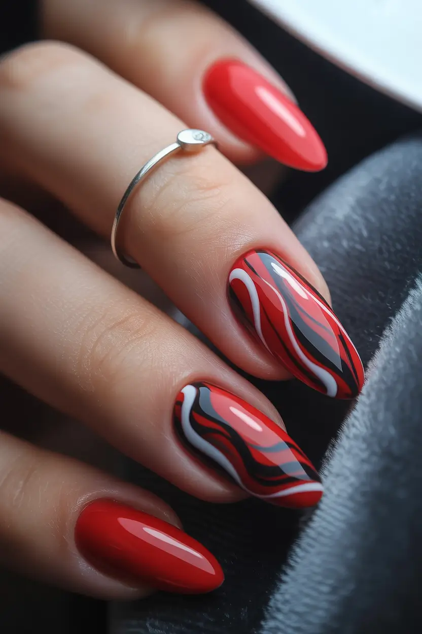 Bold Red Nails for Summer 2025 Vibes Graphic Red Meets Retro Swirl