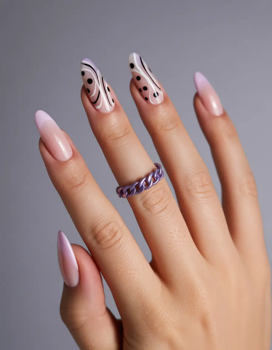 Chic Acrylic Nail Ideas for Summer 2025 Purple Swirls and Polka Dots for Playful Chic