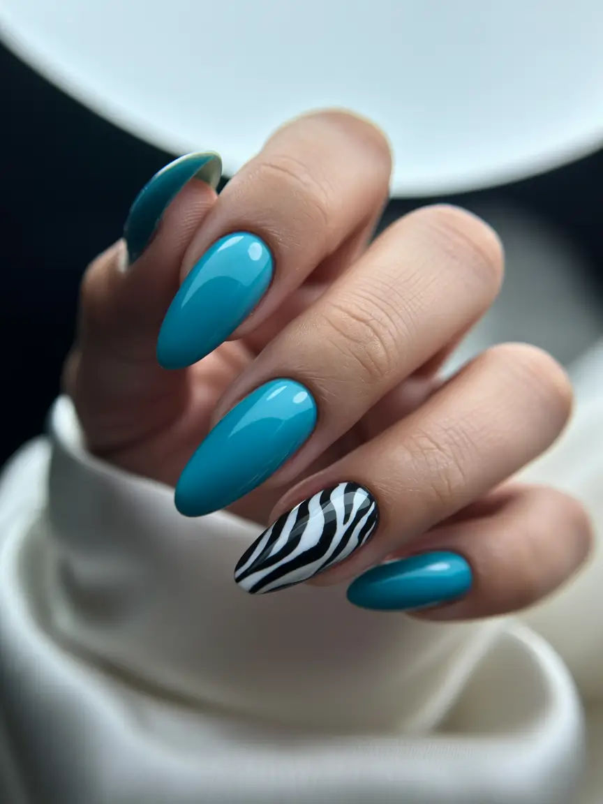 Cool Blue Nail Ideas for Summer 2025 Teal Gloss and Wild Zebra Vibes