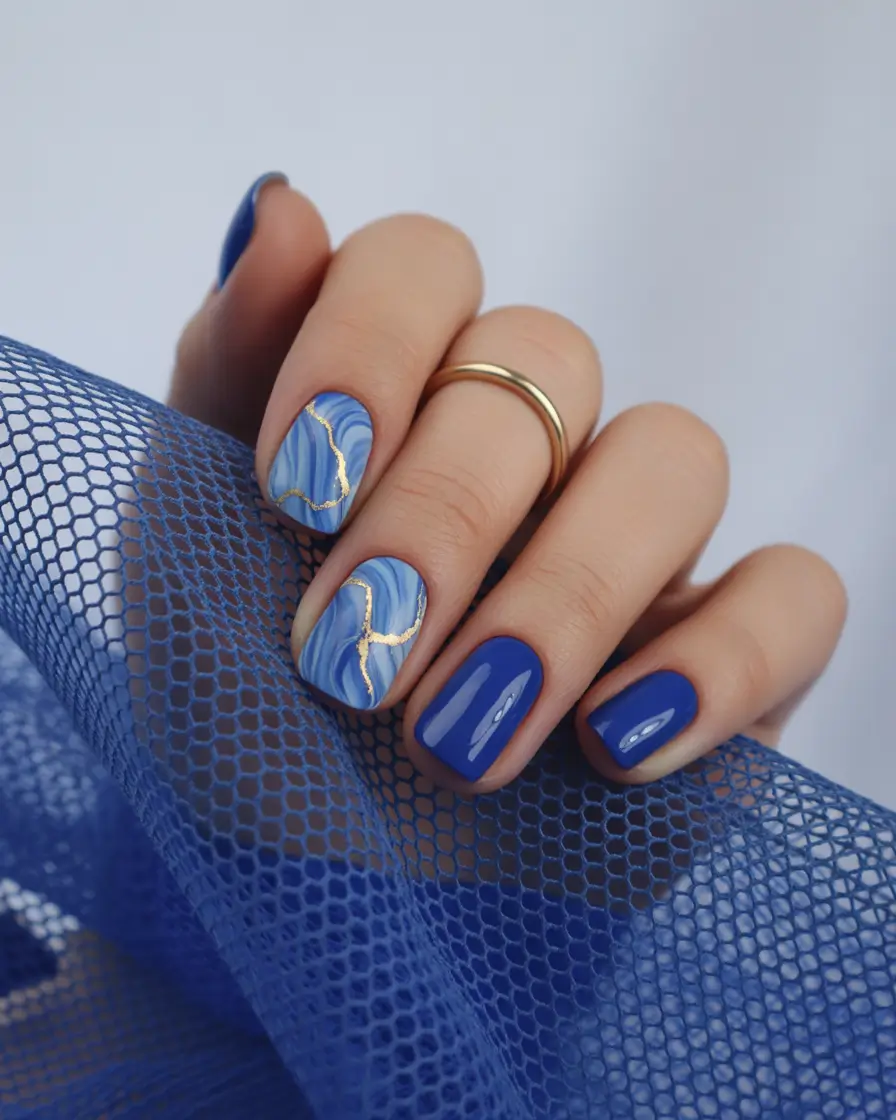 Cool Blue Nail Ideas for Summer 2025 Geode Glam with Gold Accents