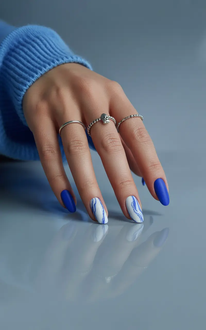 Cool Blue Nail Ideas for Summer 2025 Matte Indigo Meets Marble Art