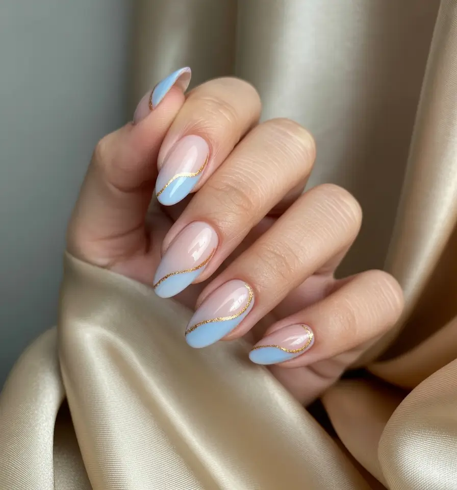 Cool Blue Nail Ideas for Summer 2025 Gold-Lined Waves on Baby Blue