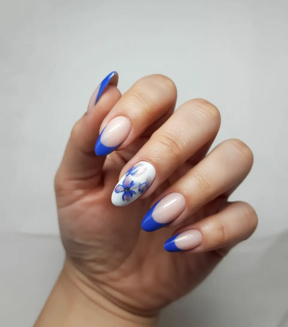 Oval Nail Inspo for Summer 2025 Looks - Blue Blossom Art with French Twist