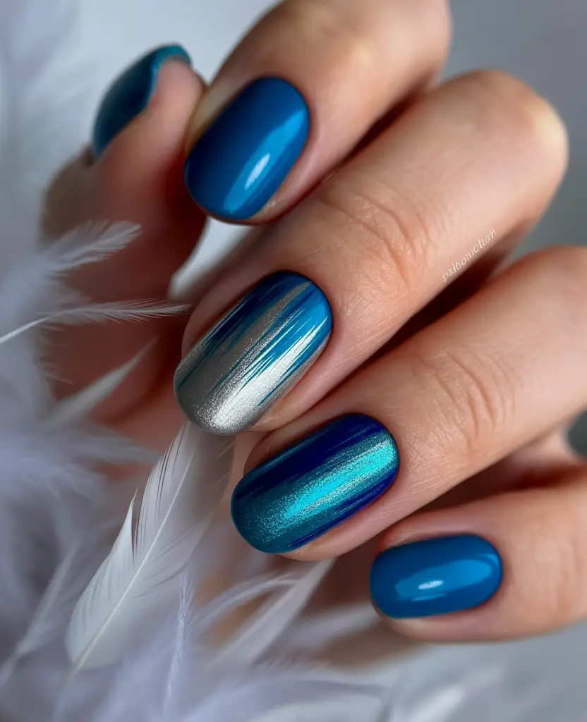 Pretty Summer Nails You’ll Want in 2025 Ocean Flicker: Metallic Brushstrokes in Deep Blues