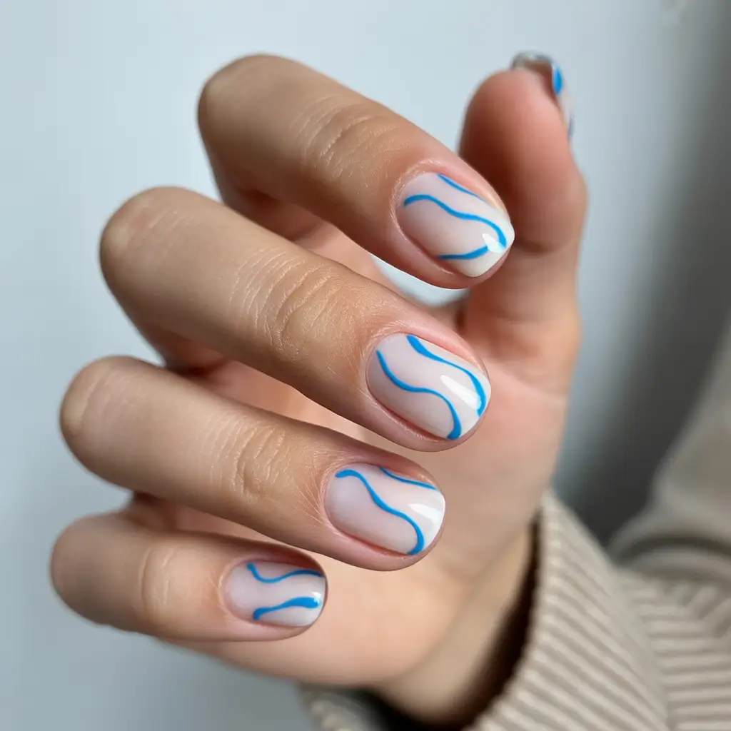 Simple Summer Nail Looks for 2025 Wavy Ocean Blue