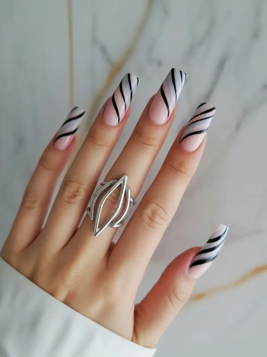 Trendy Nail Ideas to Wear This June 2025 Minimalist Black Waves on Pale Pink