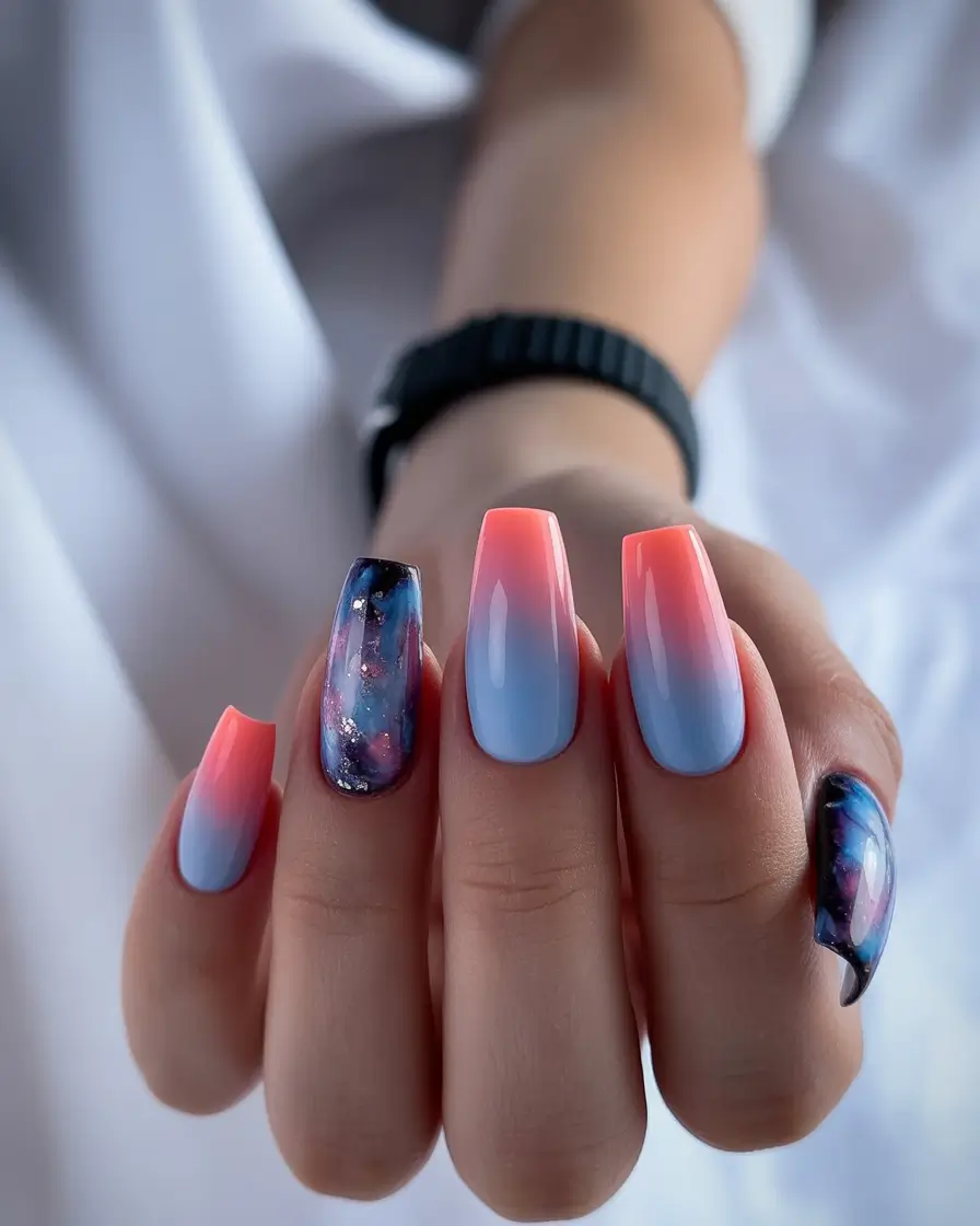 Trendy Nail Ideas to Wear This June 2025 Sunset Ombre with Galaxy Accents