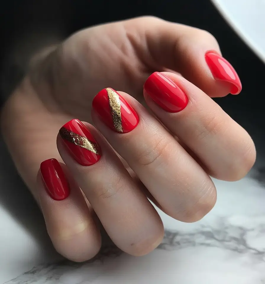 Red Summer Nails That Pop in 2025 Golden Veins on Candy-Red Rounds
