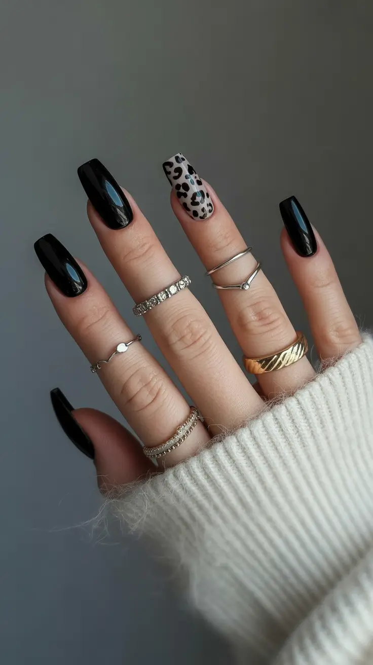 Black fall nails 2025 Leopard Accent on Classic Black