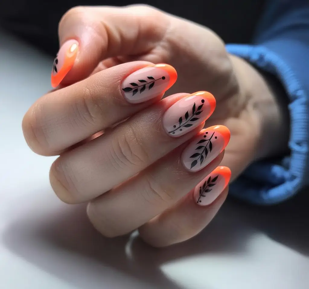 Fall-2025-nail-trends-Sunset-French-with-Leafy-Black-Detailing
