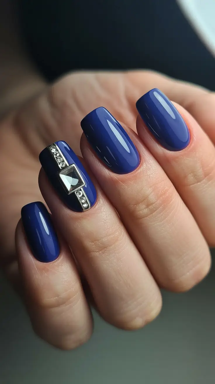 Navy Blue Fall Nail Ideas 2025 Glossy Navy with Studded Accent