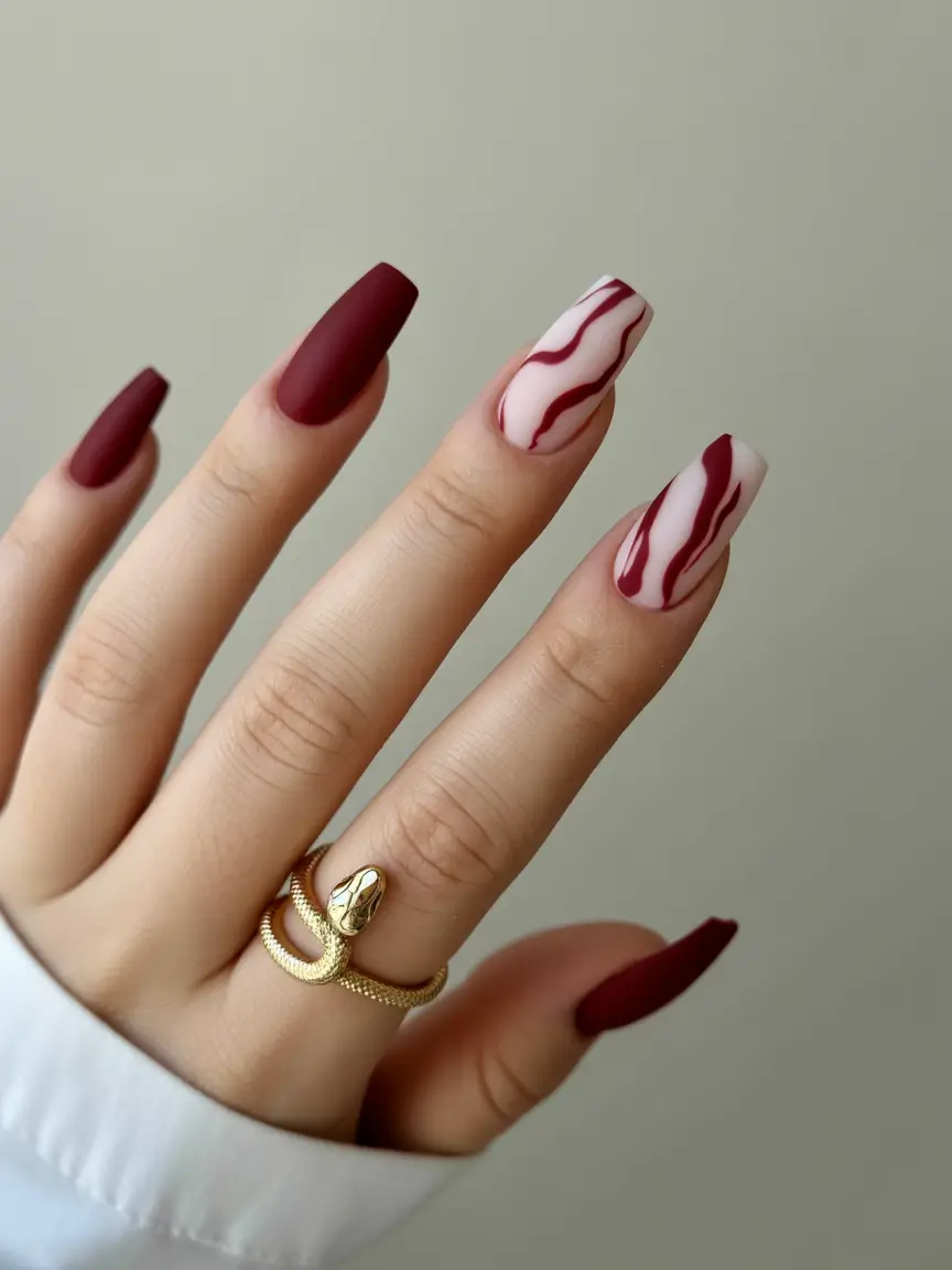 simple fall nails inspo 2025 Matte Merlot with Flowing Wine Ribbons
