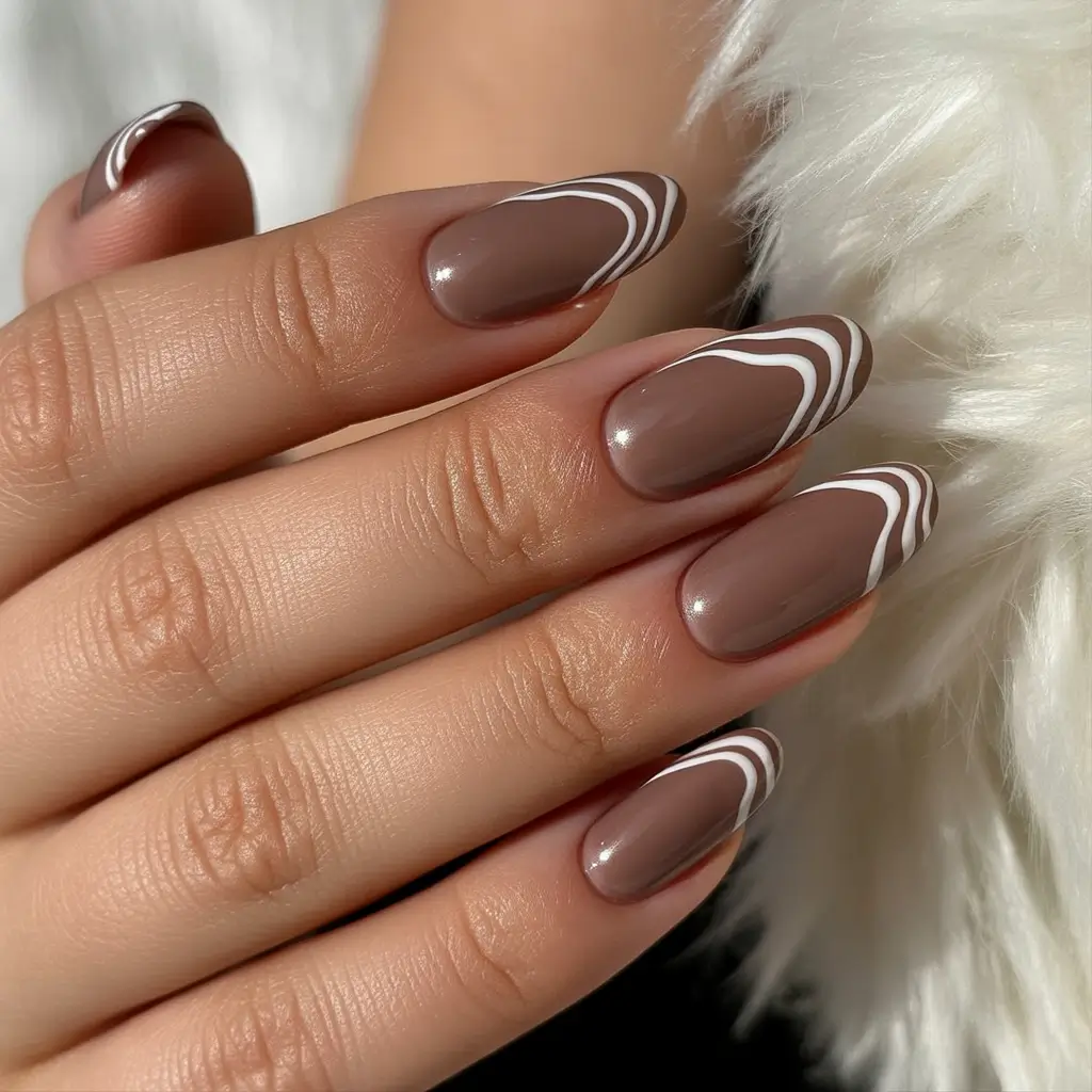 simple fall nails inspo 2025 Glossy Mocha with Soft White Swirls