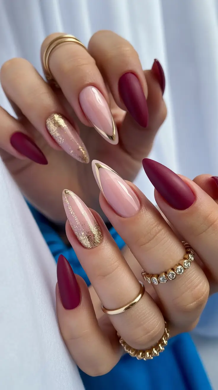 Stylish Red Manicure Winter 2025-2026 with gold trim