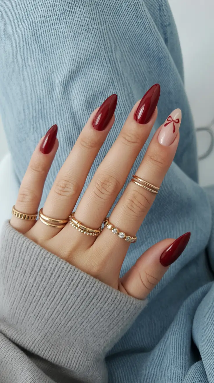 Stylish Red Manicure Winter 2025-2026 with red tips and bow detail