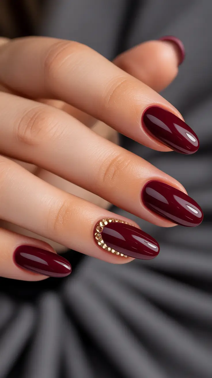 nail colors 2026 Deep Burgundy Gel with Subtle Gold Detail