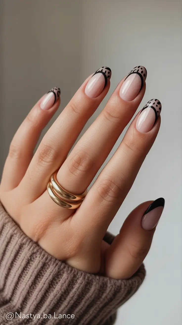 February Nails Designs 2026 Nude Nails With Black French Tips And Dotted Lace Detail