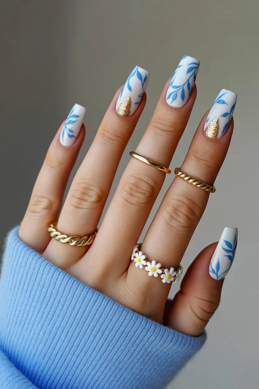 Best Blue Spring Nails Ideas 2026 White and Blue Leaf Acrylics