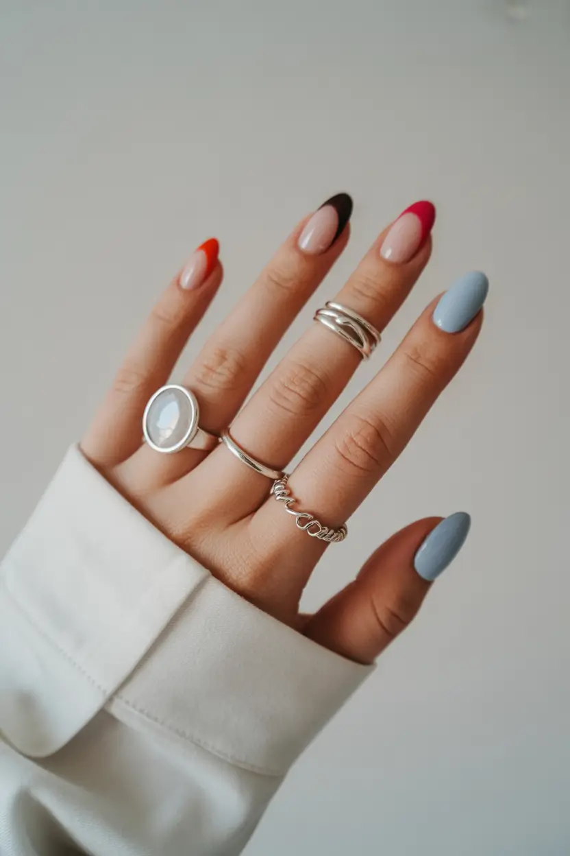 chic spring french tip nails 2026 Multicolor Almond French Tips With Soft Spring Pastels