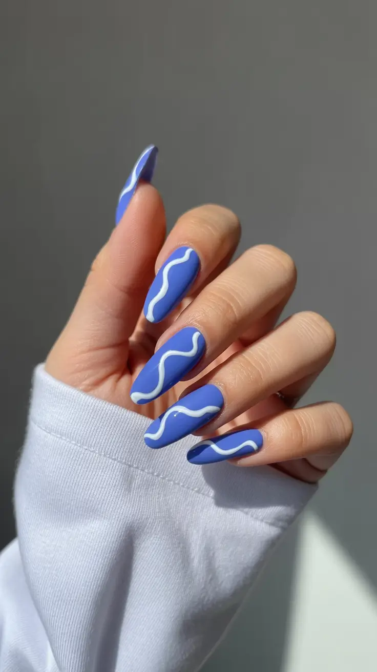 Cute Fun Spring Nails 2026 Blue Wave Almond Design