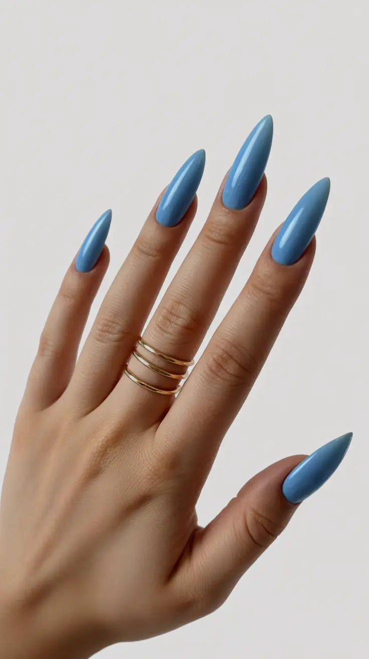 spring vacation nails 2026 Glossy Blue Almond Nails