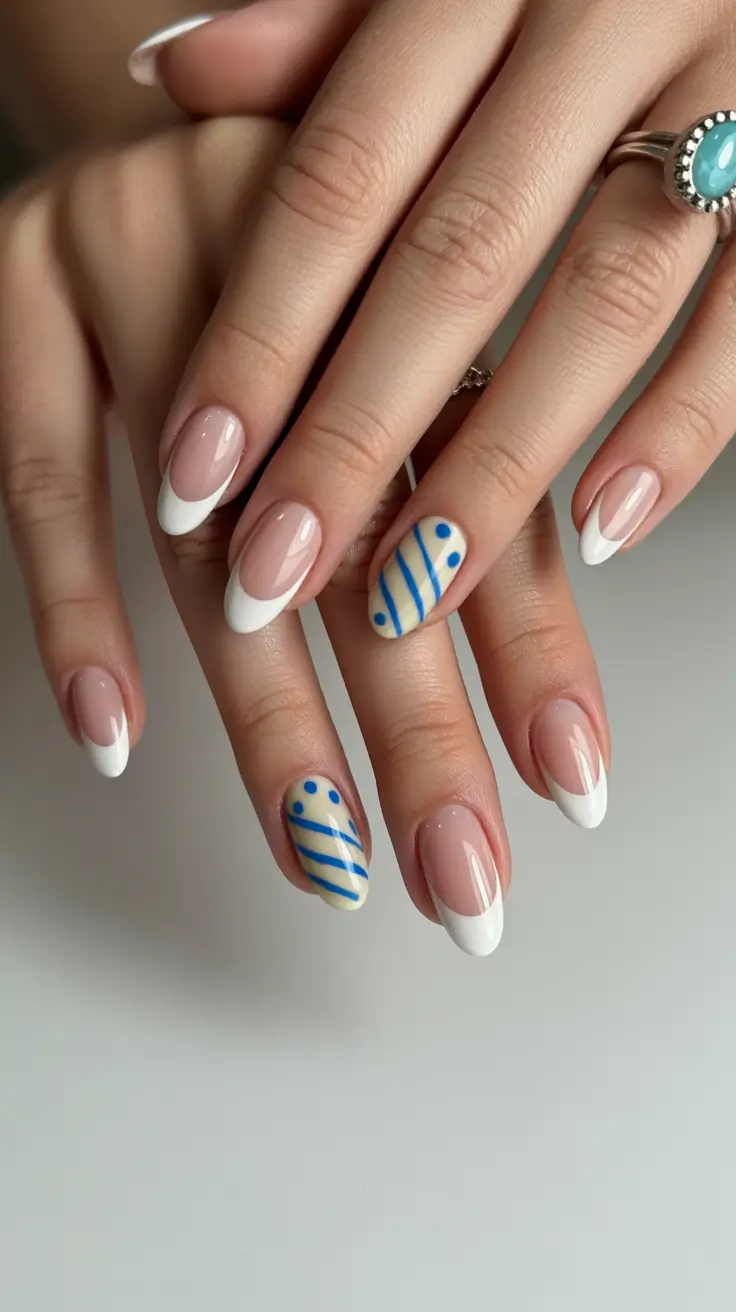 spring vacation nails 2026 French Tip With Blue Design
