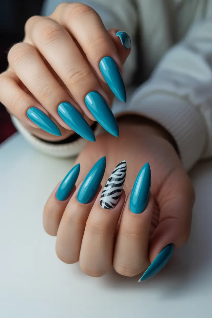 Cute Spring Long Nails 2026 turquoise stiletto nails with zebra design