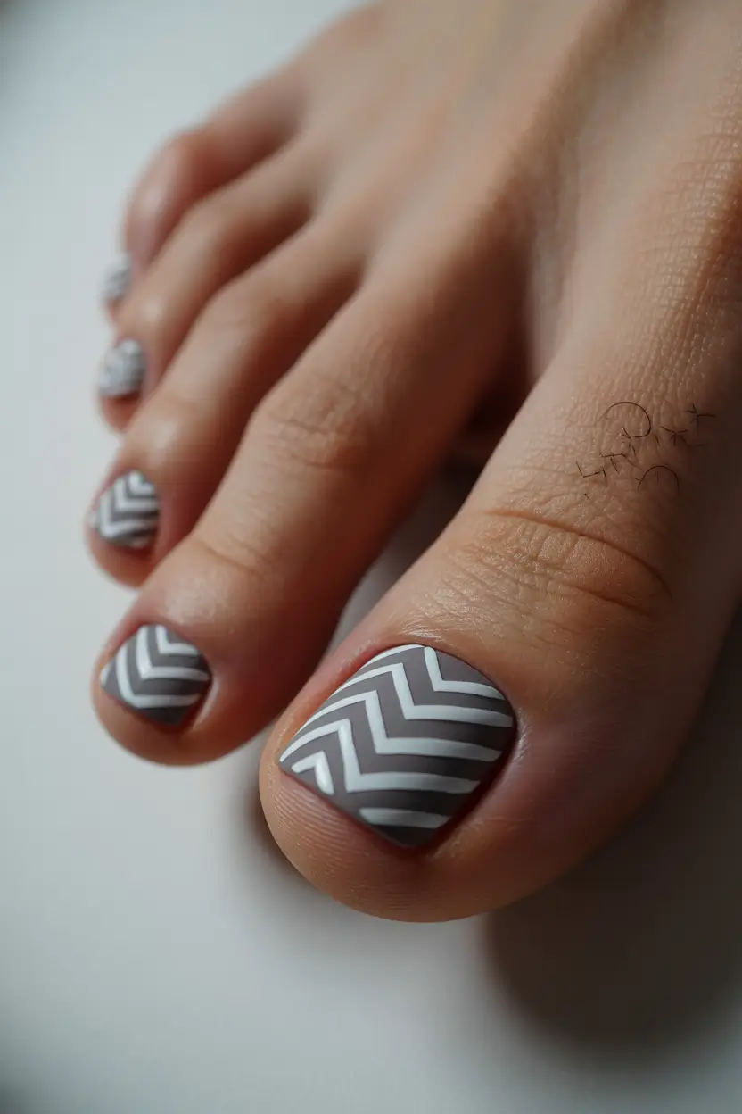 Cute Spring Toe Nail Color Ideas 2026 Modern Chevron Pedicure With Soft Gray Contrast