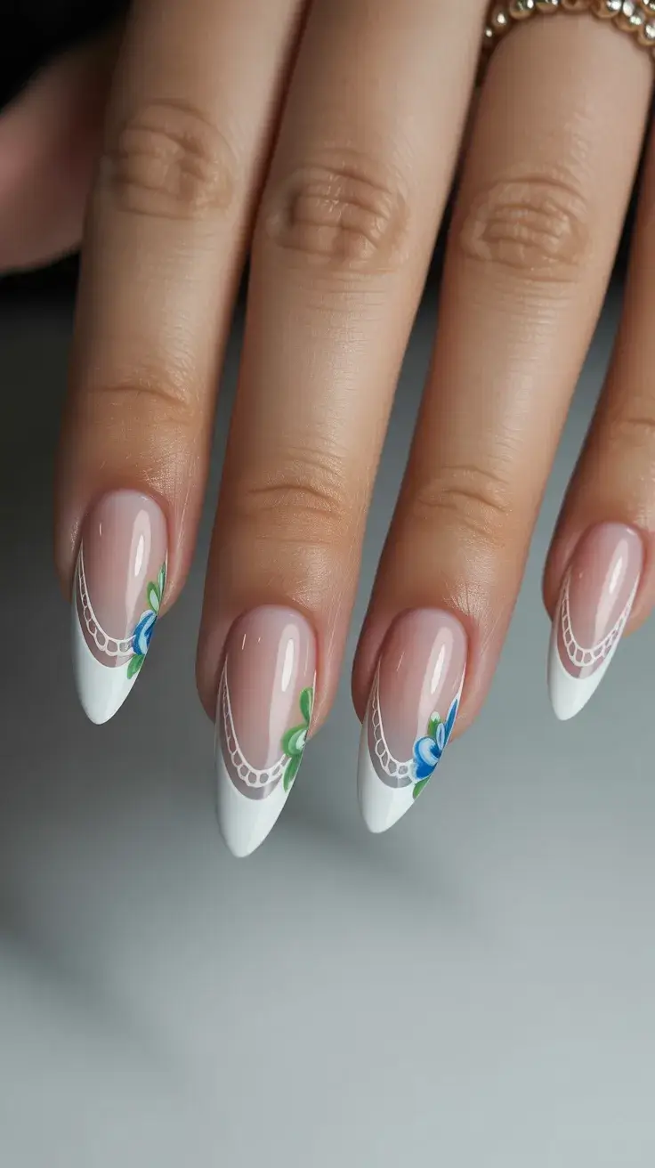 Easter Nails Ideas 2026 Simple Easter French Nails with Blue Floral Details