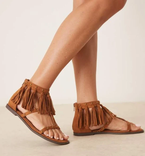 shoes ASOS Feather Studded Fringe Flat Sandals ASOS $21.99