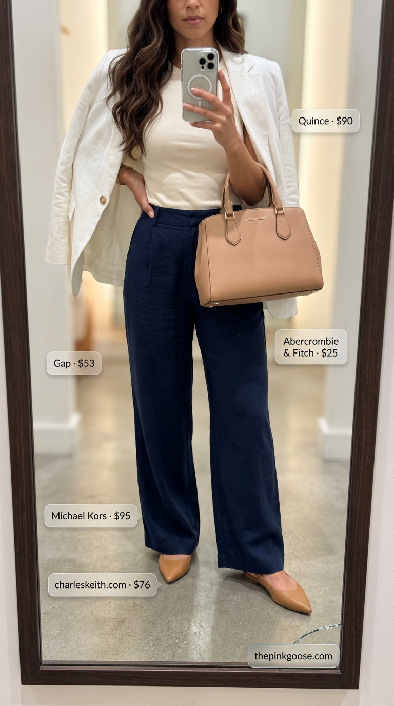 Understated navy wide-leg pants, white linen blazer, and cream knit top create a refined look for summer Birthday outfits for women 2026.