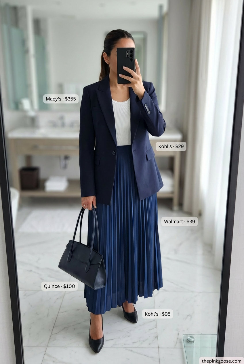 Conference Chic: Summer Work Outfits for Women 2026 Sophisticated navy and white summer work outfit for women 2026. Features a navy pleated maxi skirt, white knit top, and tailored blazer for a conference.