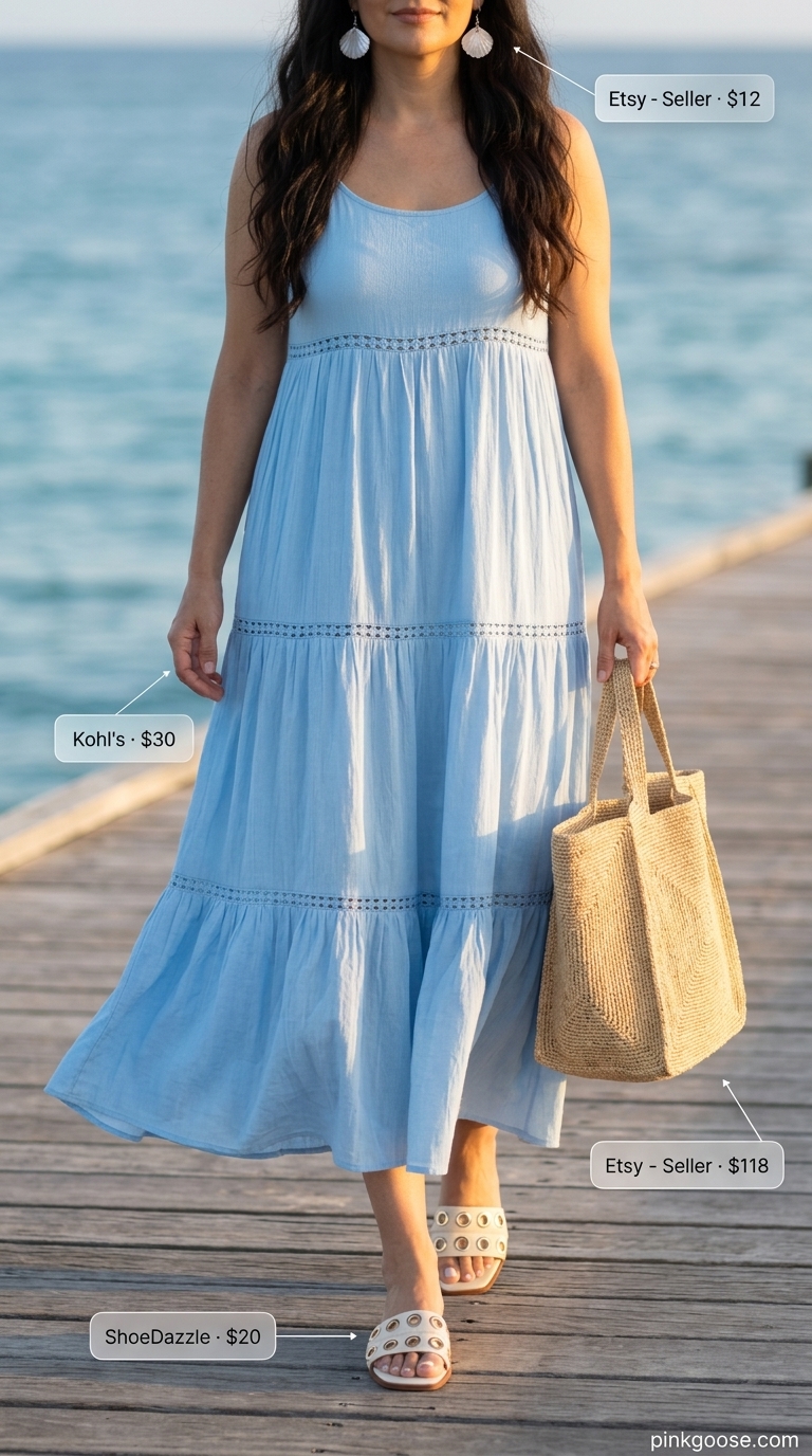 Summer Dresses 2026: Sky Blue Beach Maxi Sky blue tiered cotton maxi dress for beach vacations. Style with raffia tote, white slides, and shell earrings.