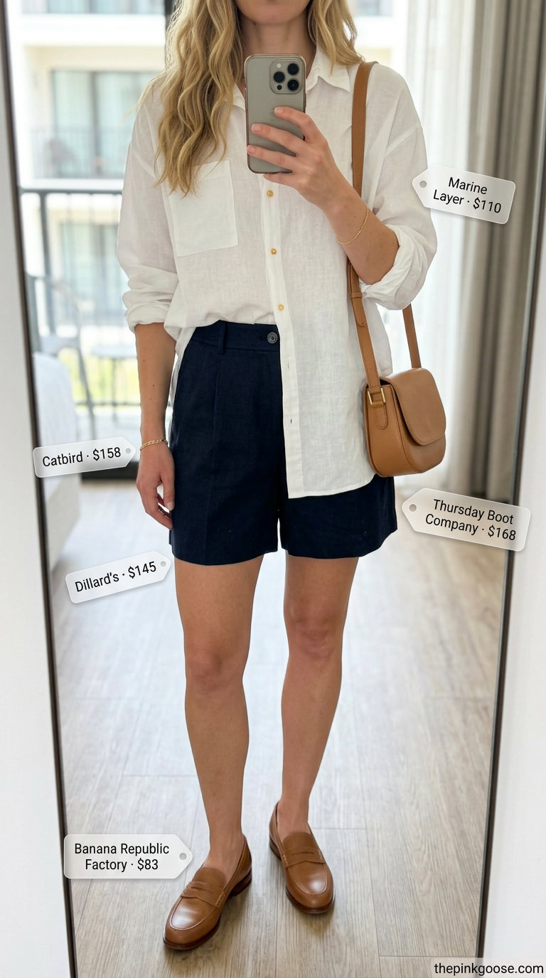 Hamptons summer old money outfit women 2026: White shirt, navy shorts for harbor walk.