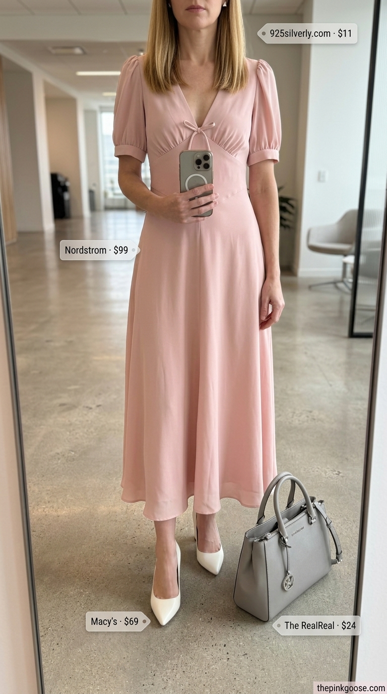 Light summer work outfits for women 2026: Blush pink midi dress, cream heels, and silver earrings for an elegant office look.