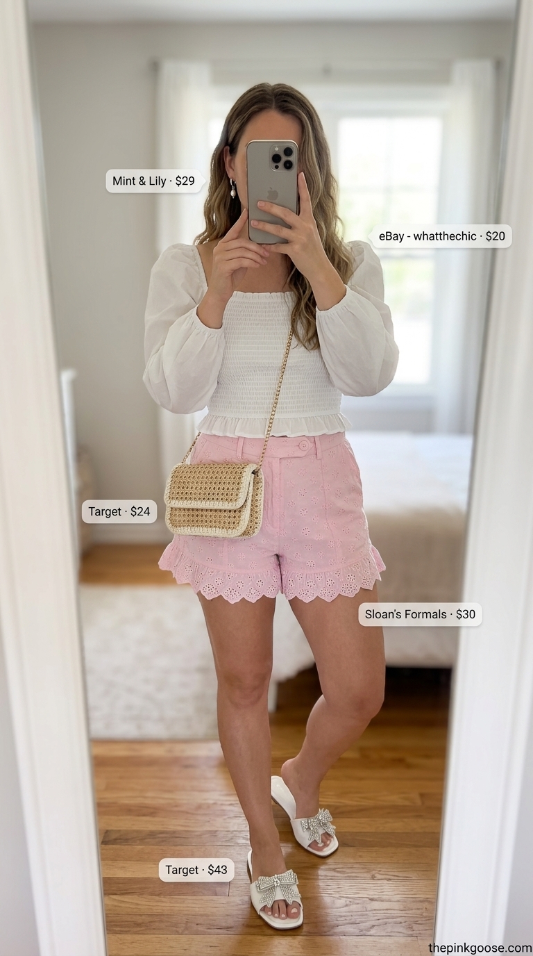 Pink coquette summer outfits 2026: Blush pink eyelet shorts, white puff sleeve crop top, straw bag, pearl earrings for a casual park day.