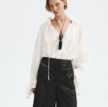 top H&M Ladies Oversized Linen-Blend Shirt H&M $44.99